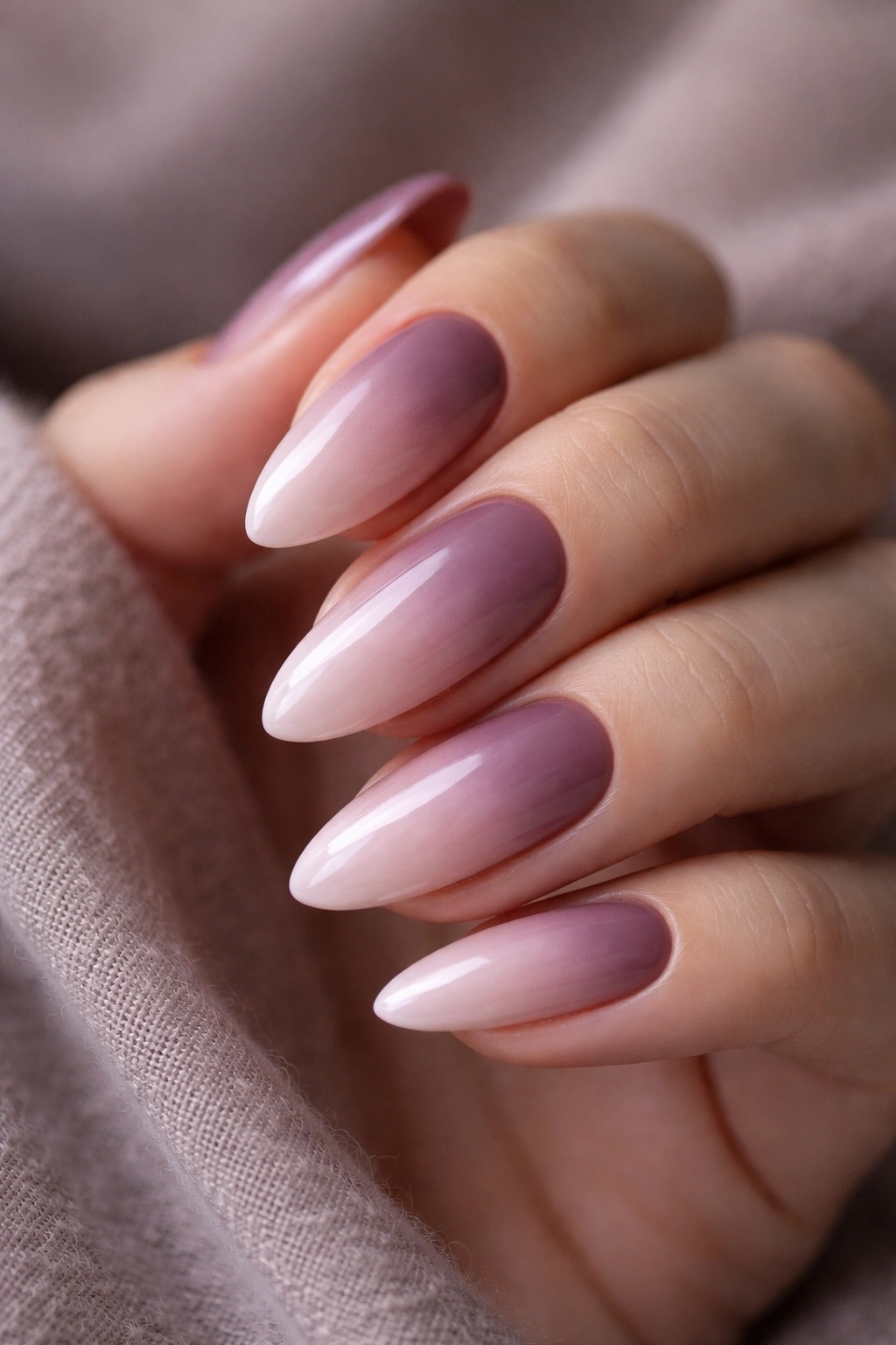 Almond nails mauve to pale pink gradient with cool undertones