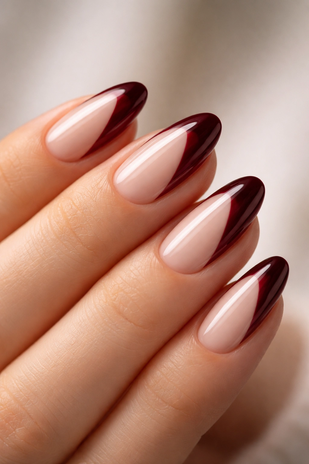 Almond nails with deep merlot side tips