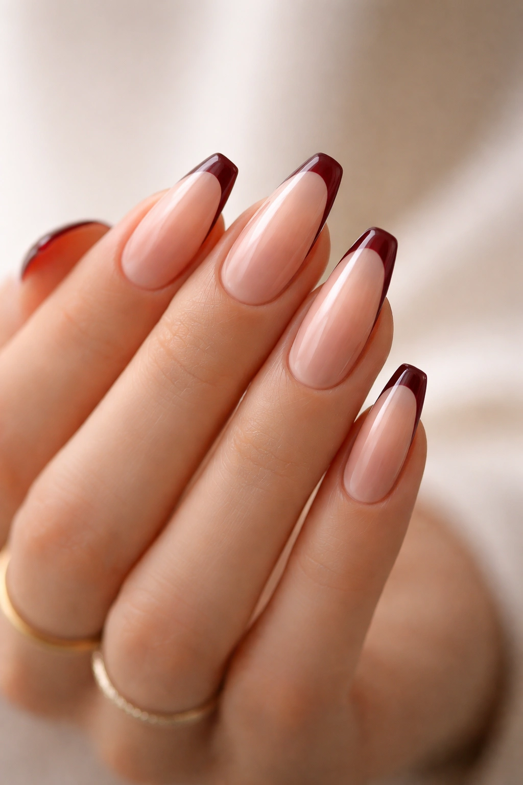Dark red micro French ballerina nails with tiny tip
