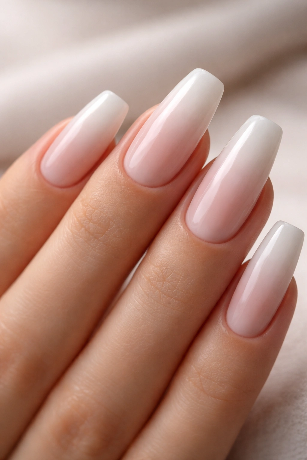 Ballerina nails with milky base and blurred French fade