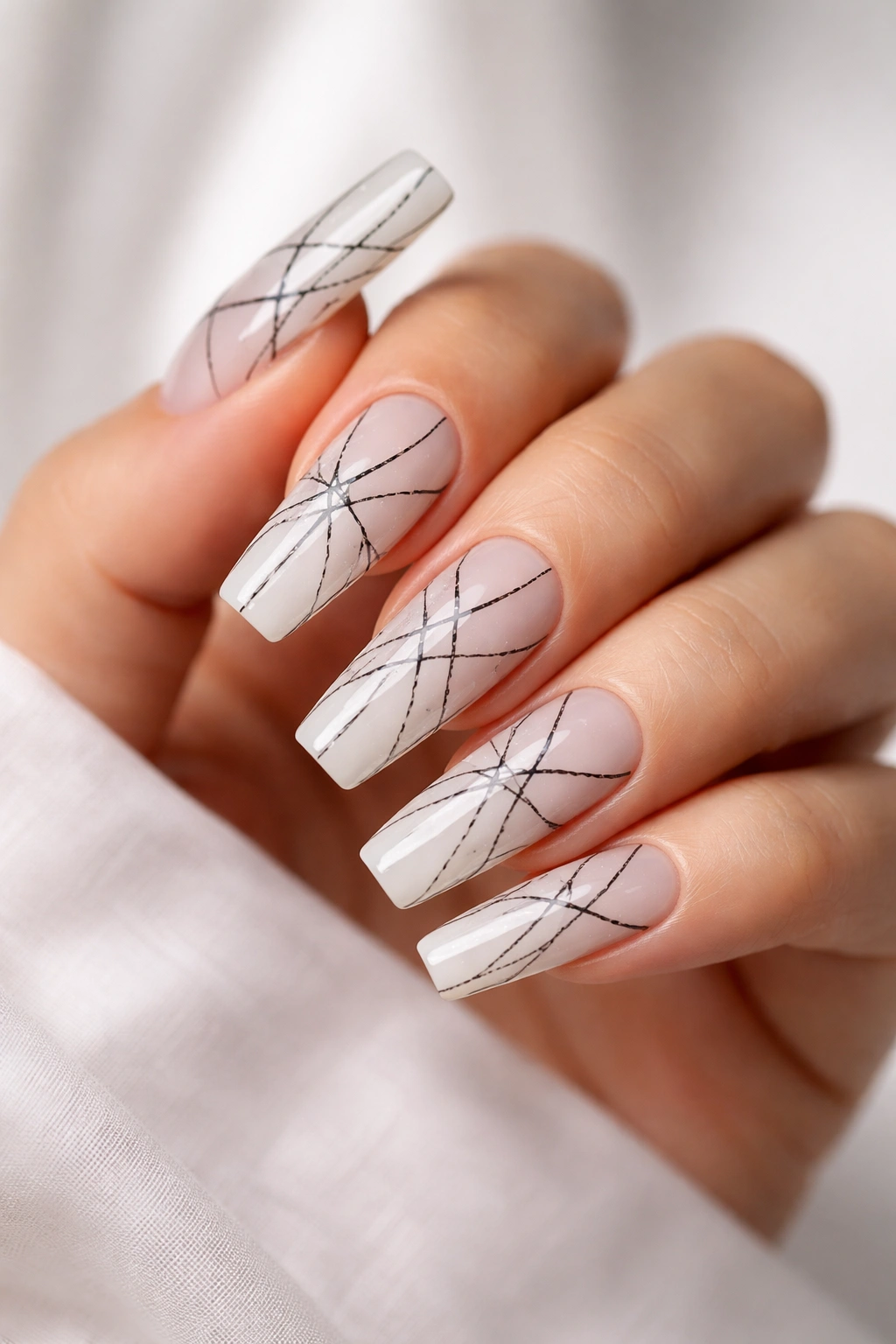 Milky white coffin nails with black micro-lines