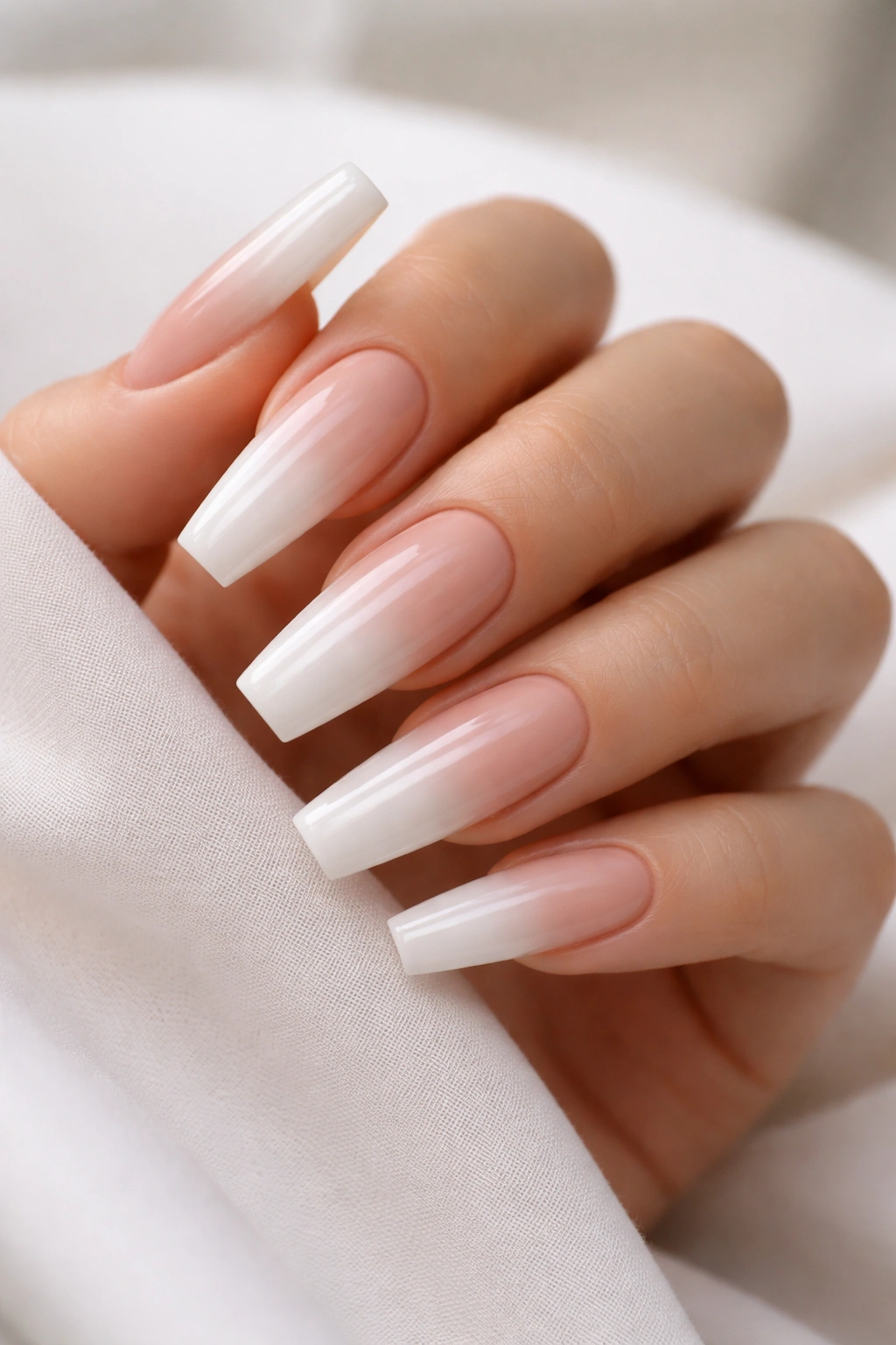Milky white nails with nude to milky white reverse gradient