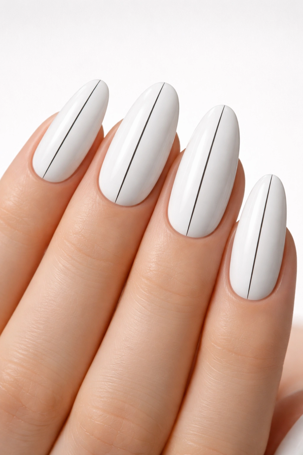 White nails with a single thin black line running center of each nail