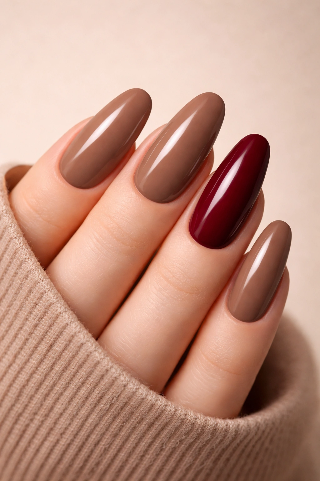 Mocha nails with burgundy accent nail on ring finger