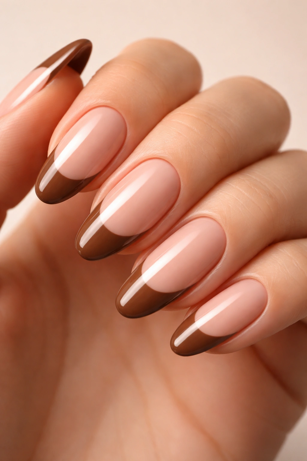 Mocha French tips nails on nude base with dark brown tips