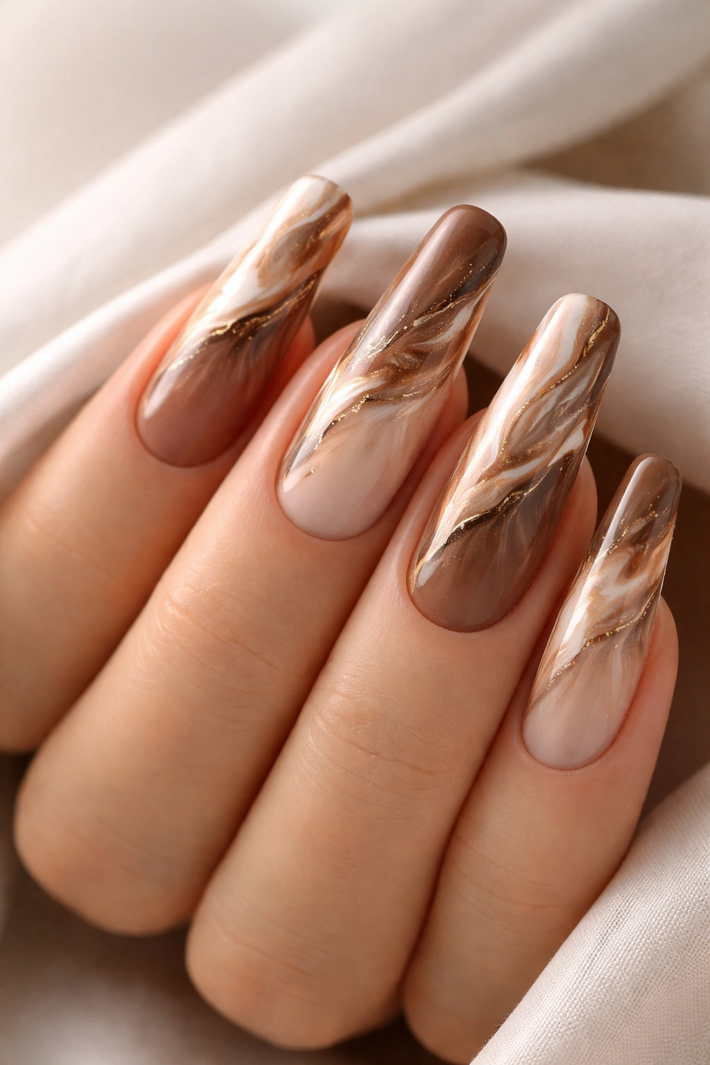 Marble mocha and cream nail design with brown gradient