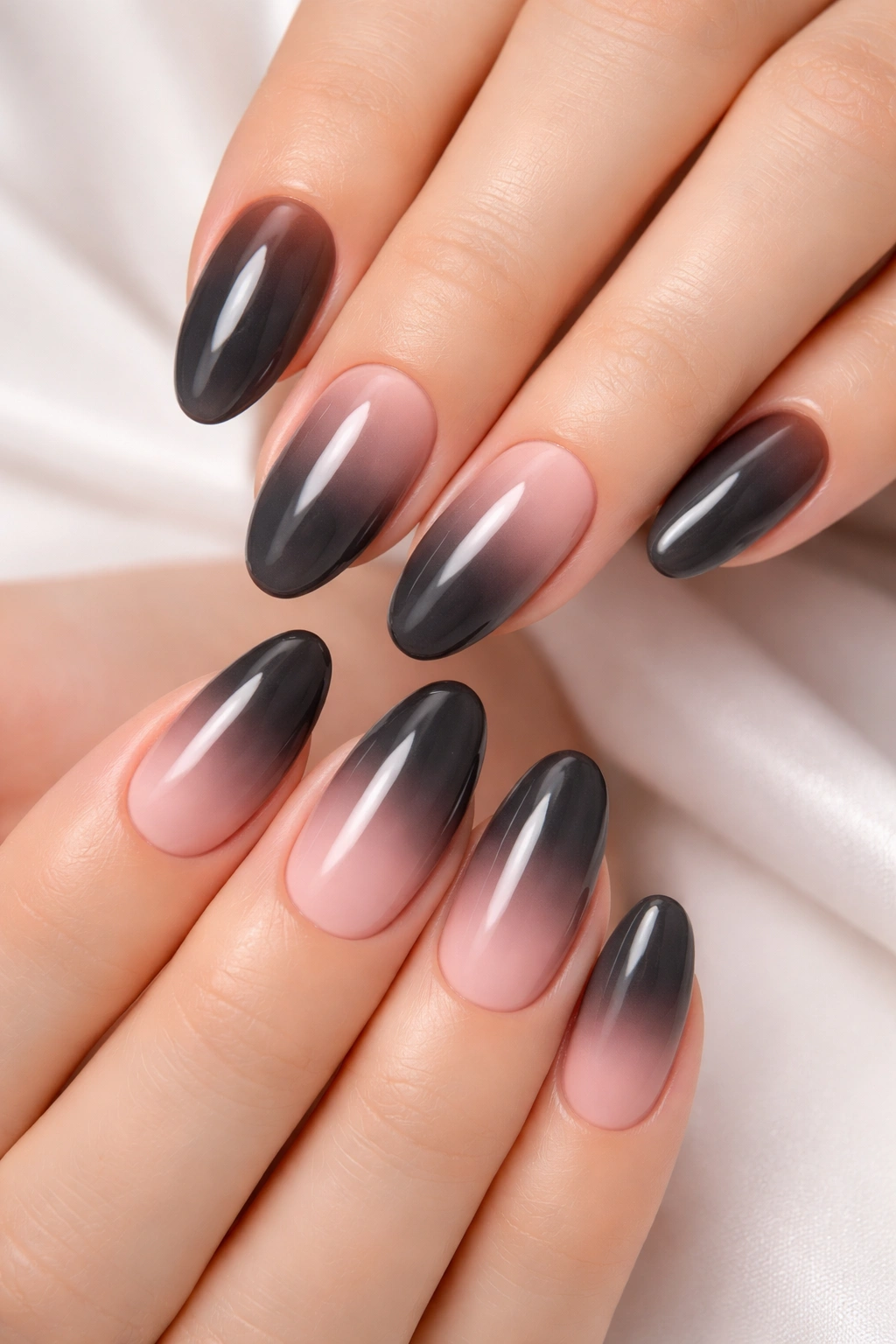 Charcoal grey to soft pink ombre nails