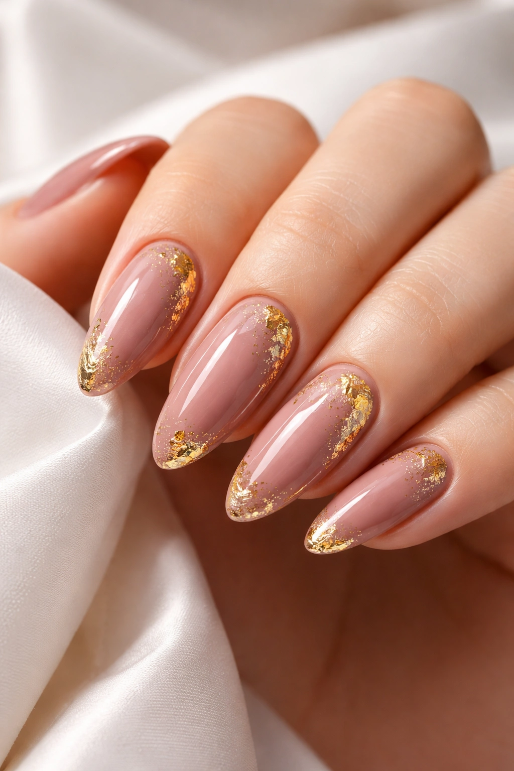 Dusty rose nails with gold foil accents