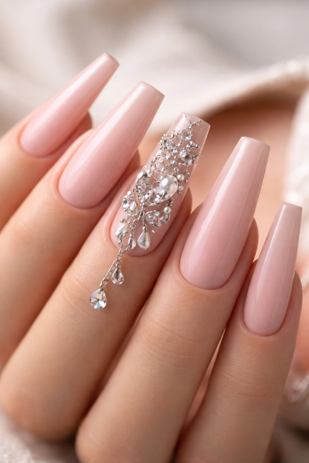 Minimalist nails with charm clusters showing balance and placement principles