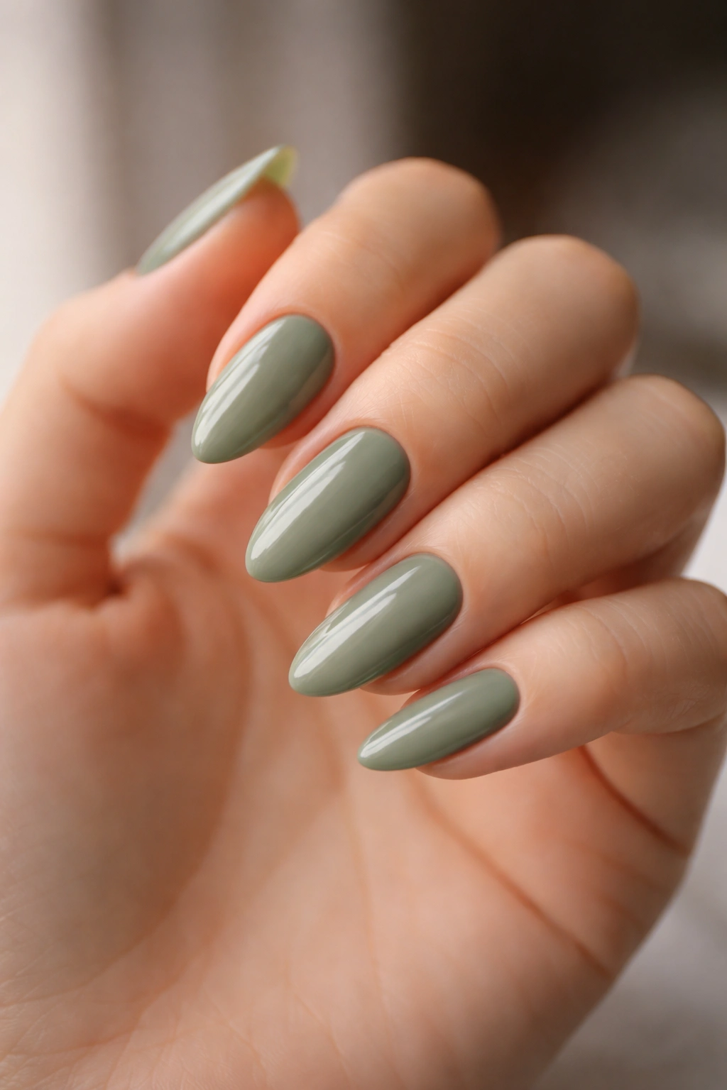 Close-up of almond nails showing ideal length and shape