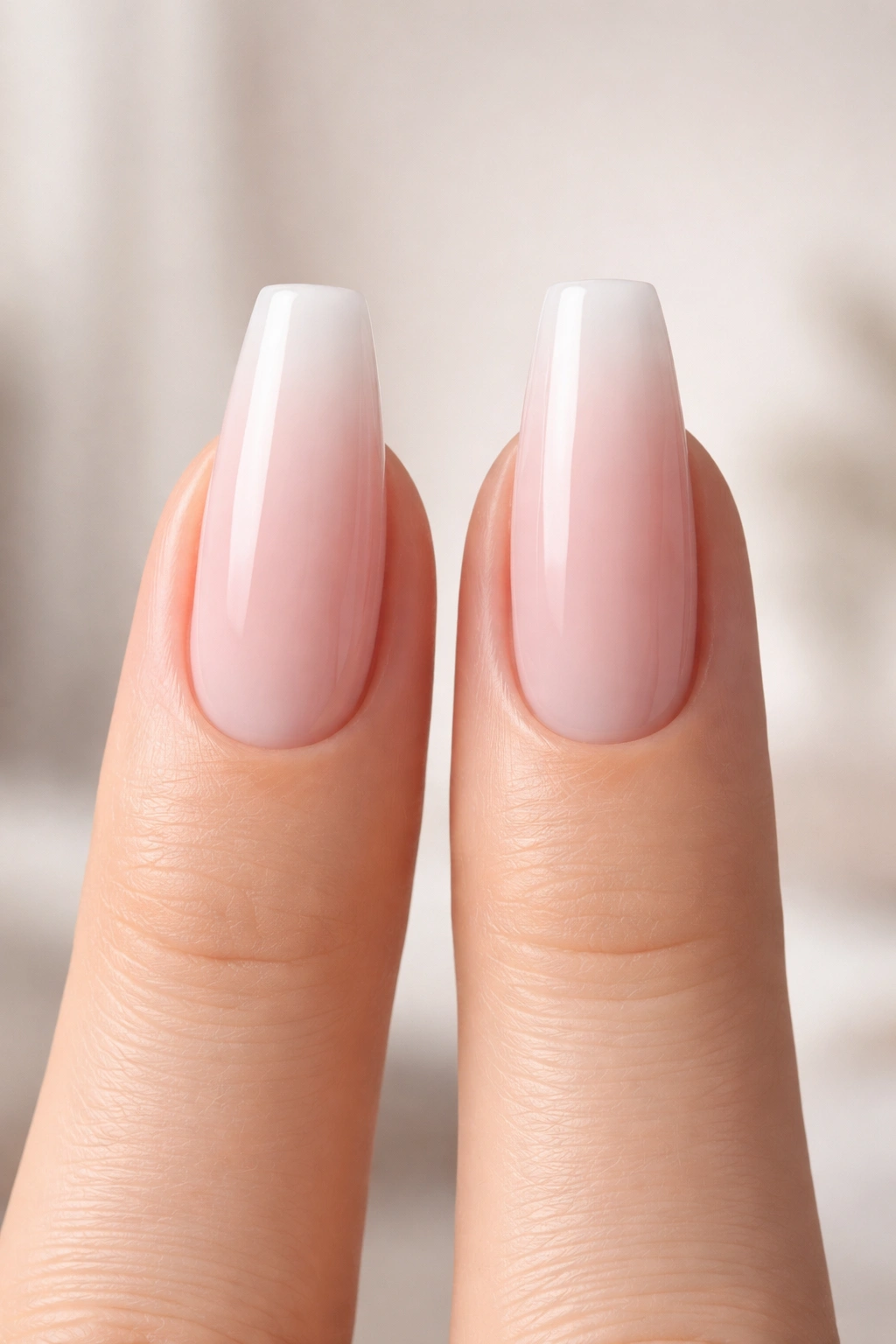 Close-up of two nail shapes on a hand: ballerina and coffin, illustrating a practical decision framework for nails