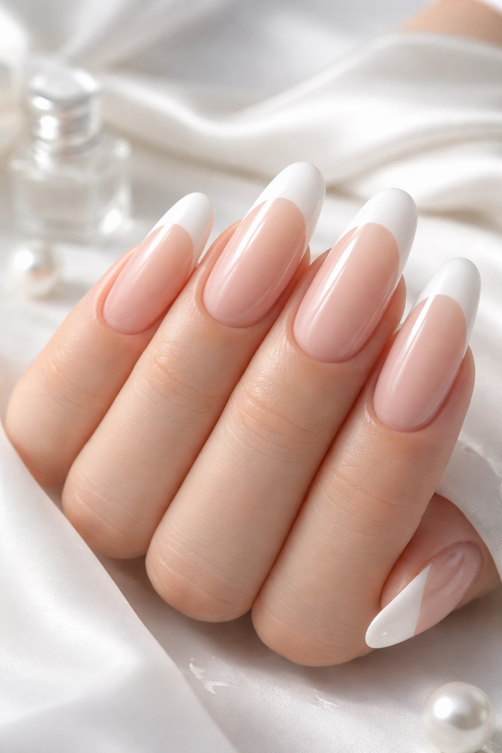 Calm close-up of rounded French tips conveying elegance and versatility