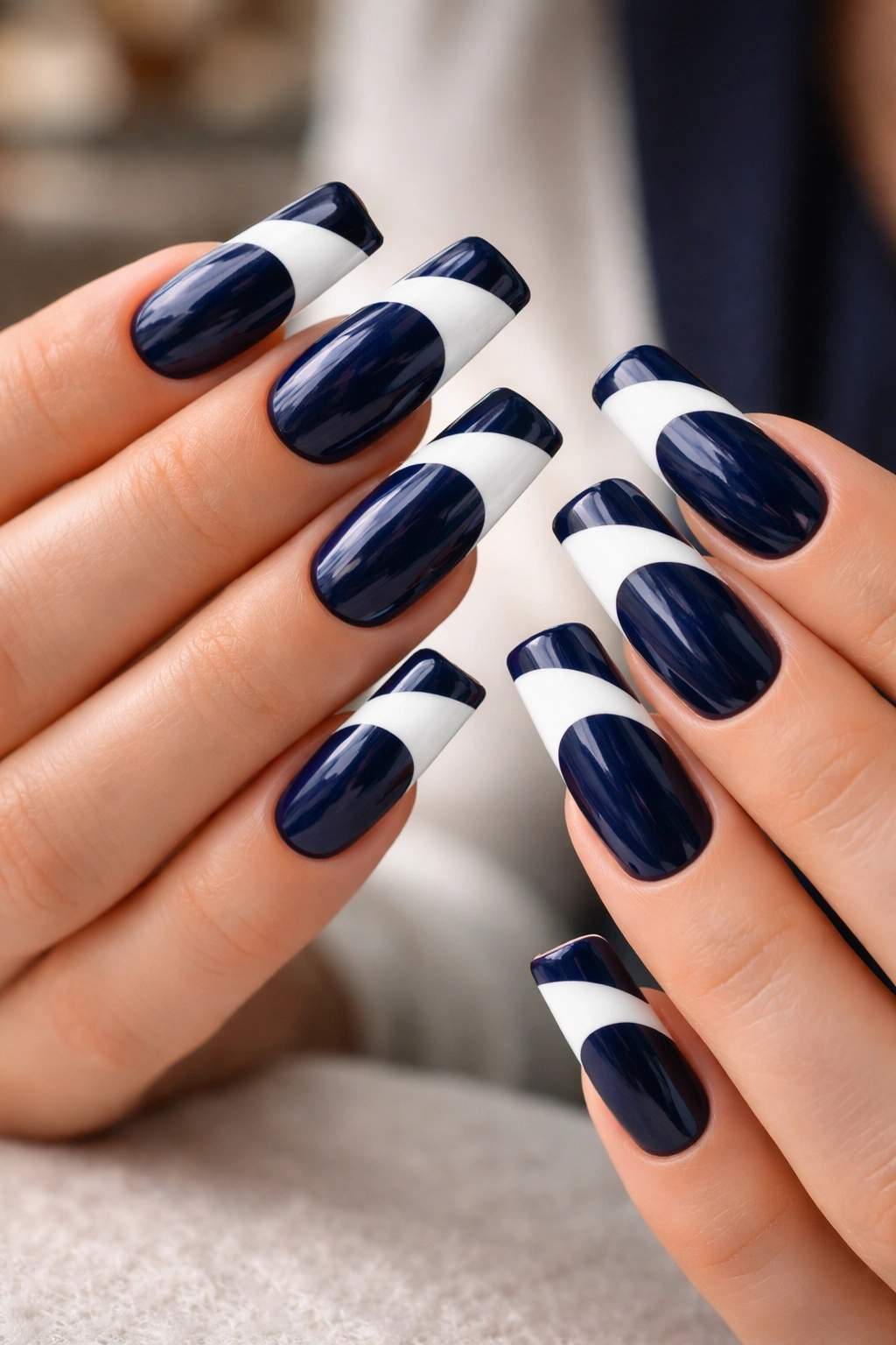 Close-up of navy duck nails with white French tips