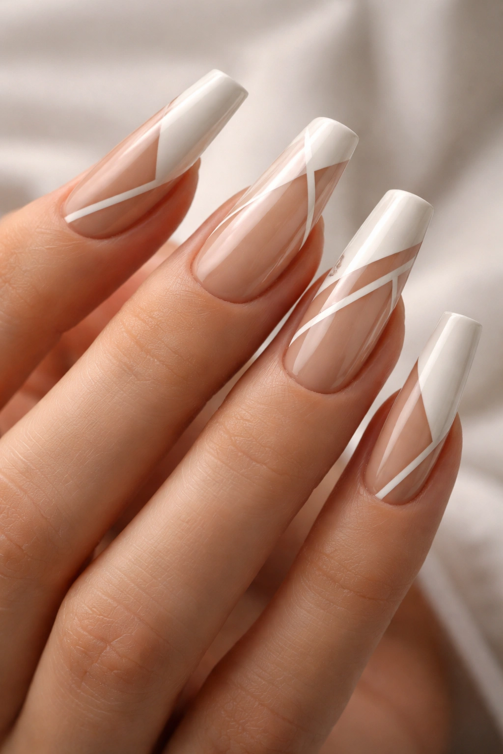 Coffin nails with negative space patterns showing bare nail areas