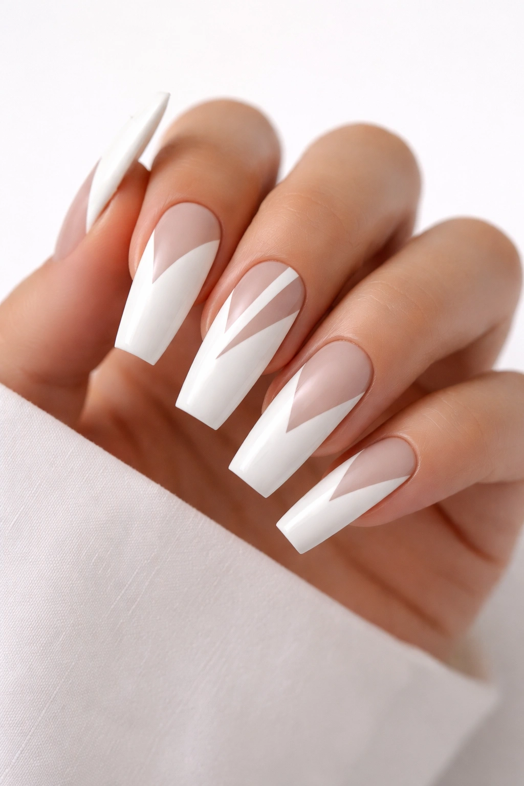 White coffin nails with negative-space geometric design