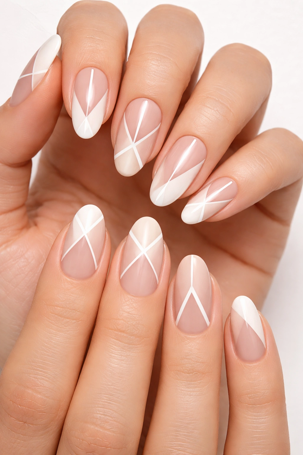 Nails with geometric negative-space patterns on both hands