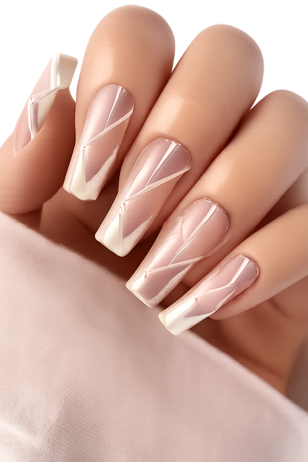 Close-up of coffin nails with nude base and geometric lines creating negative space