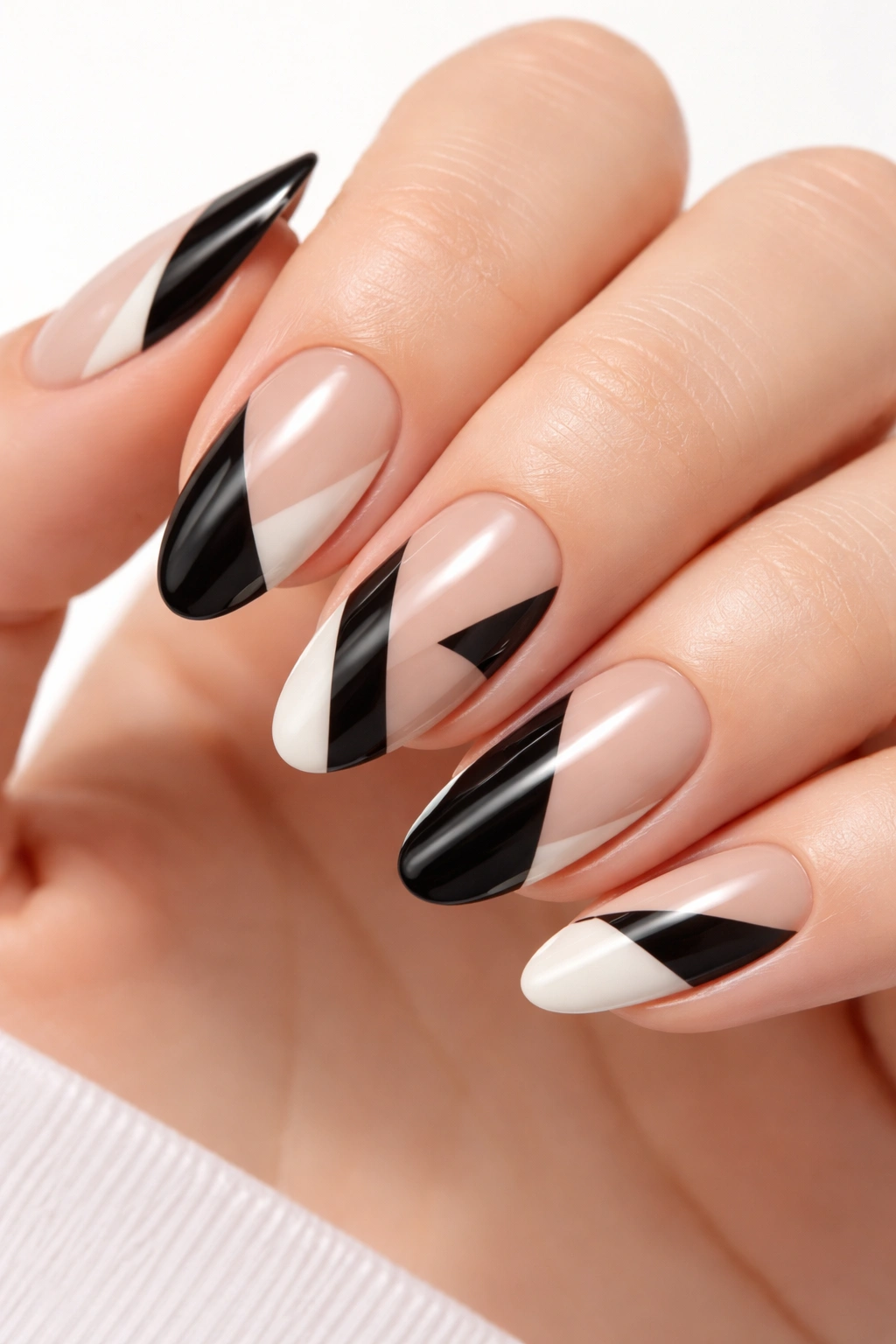 Nails showing intentional negative space with geometric cutouts