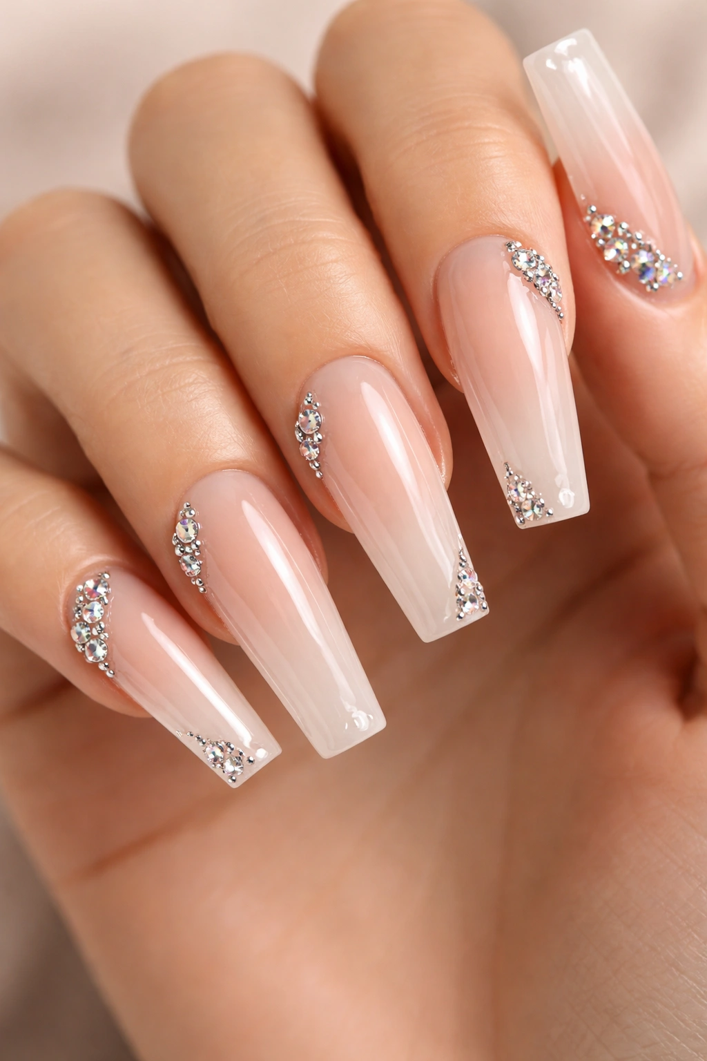 Coffin nails with negative space and rhinestones at the corners