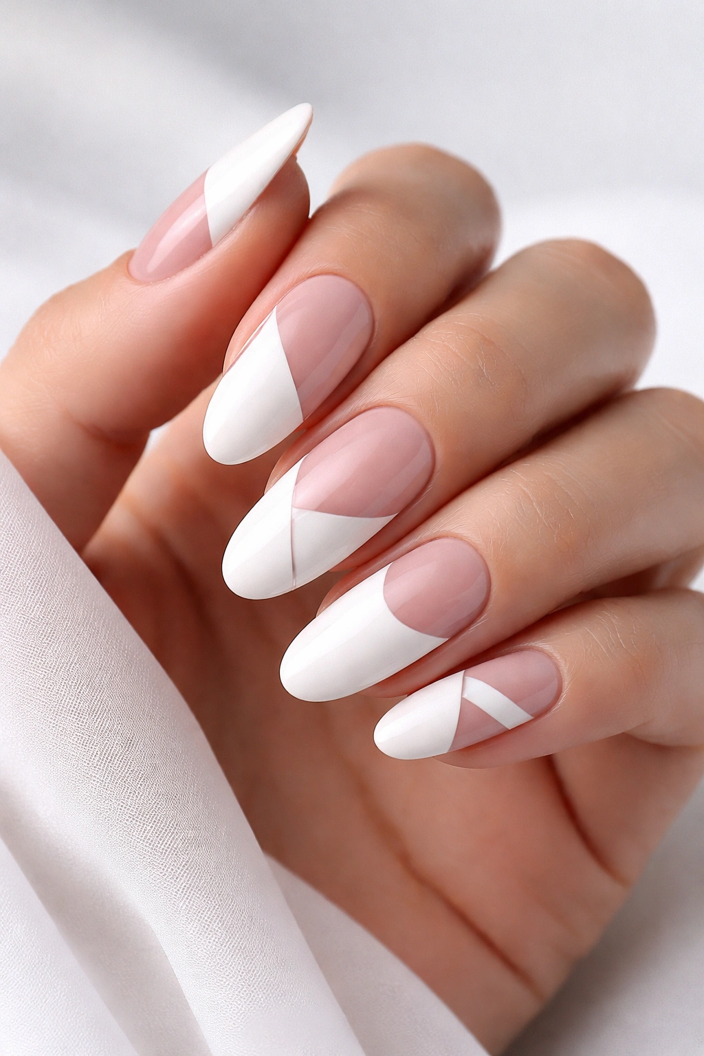 White nails with negative space geometric patterns