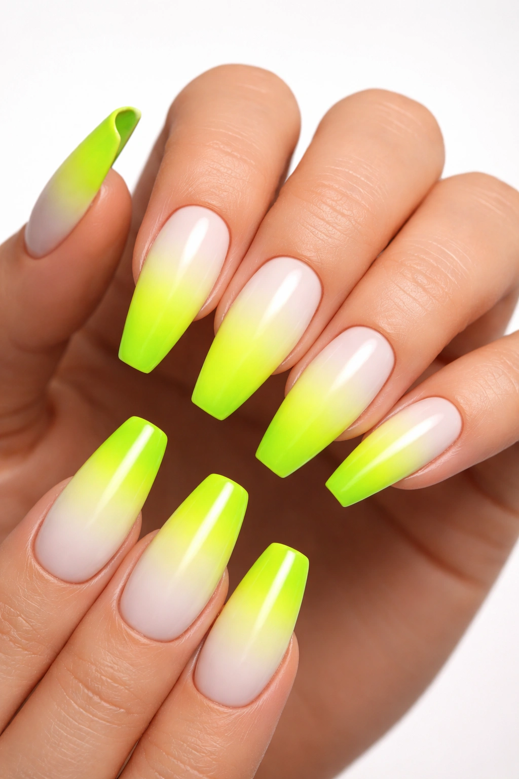 Neon lime ombre nails with white-to-lime gradient under studio light