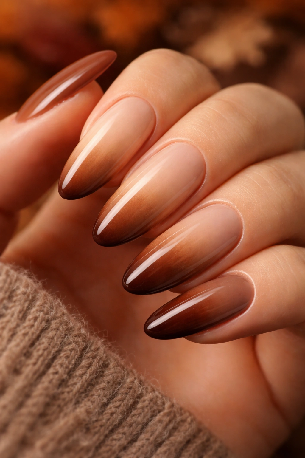 Neutral ombré nails blending cream caramel and chocolate brown