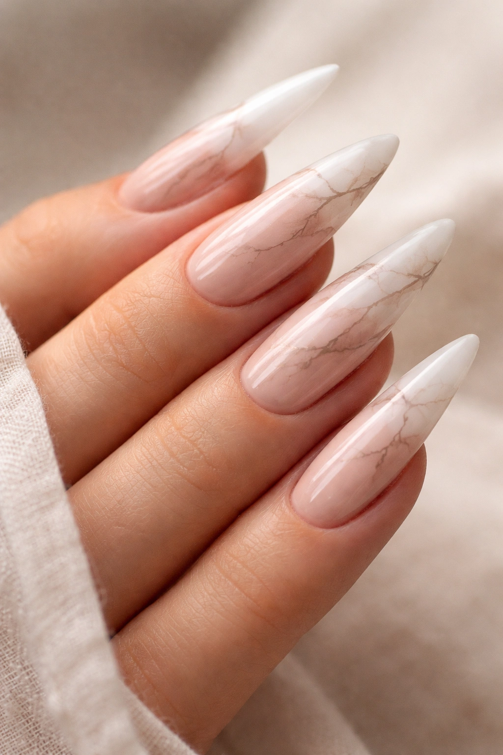 Nude ombre nails with delicate taupe marble veins