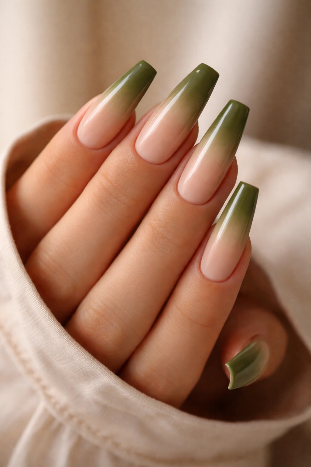 Coffin nails with nude base and olive green gradient tips