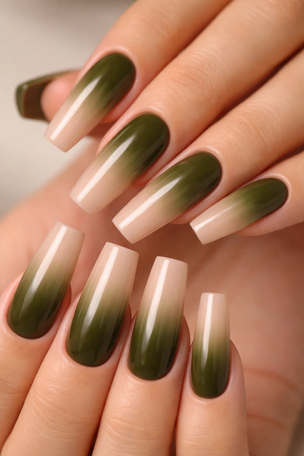 Olive green to nude ombre coffin nails close-up