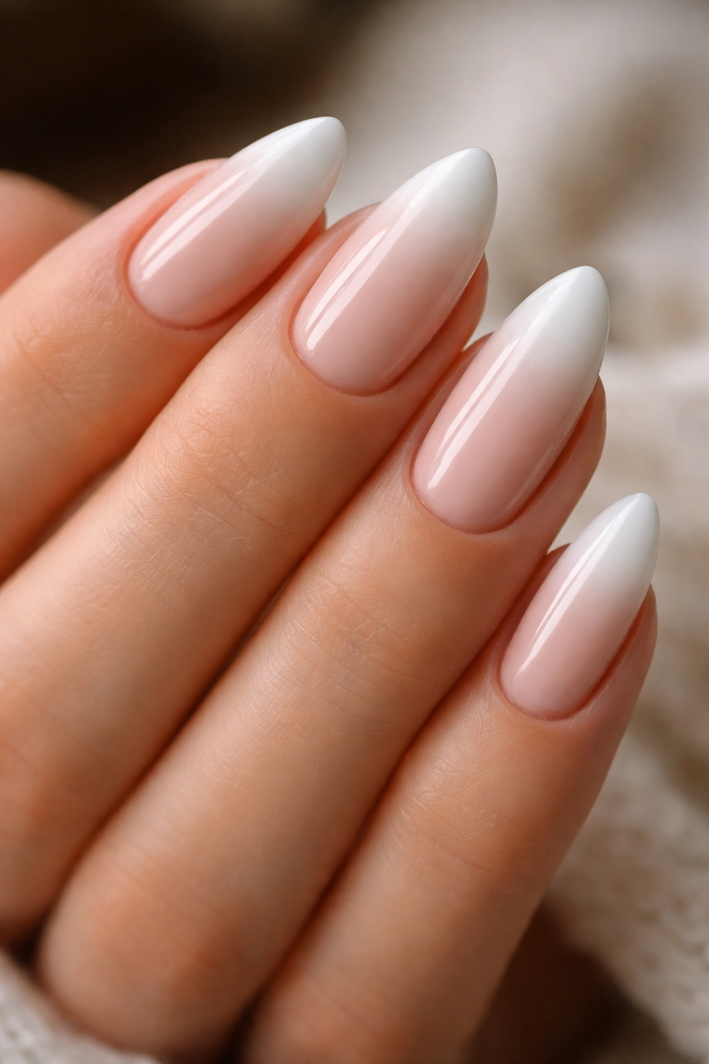 Almond nail with white ombre fade at tip