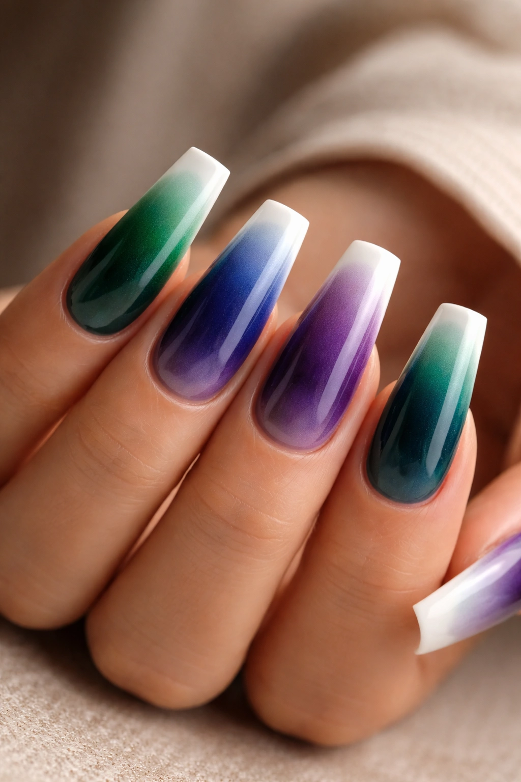Duck nails with jewel-tone ombre gradient fading to white tips.