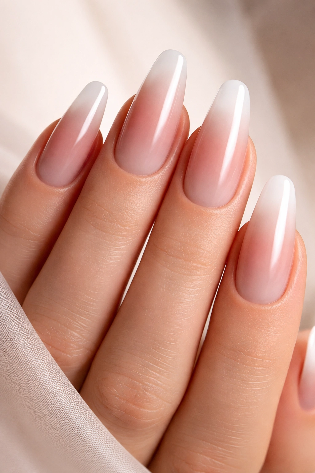 Ombré gradient nails transitioning from dark to light