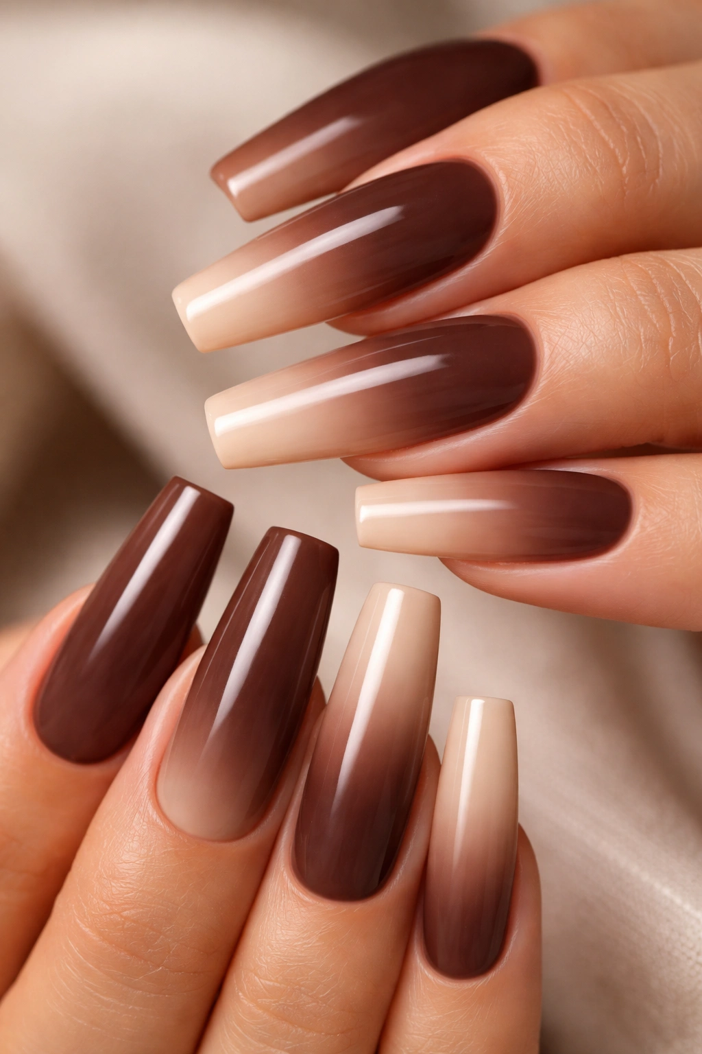 Long coffin nails with brown to nude ombre gradient