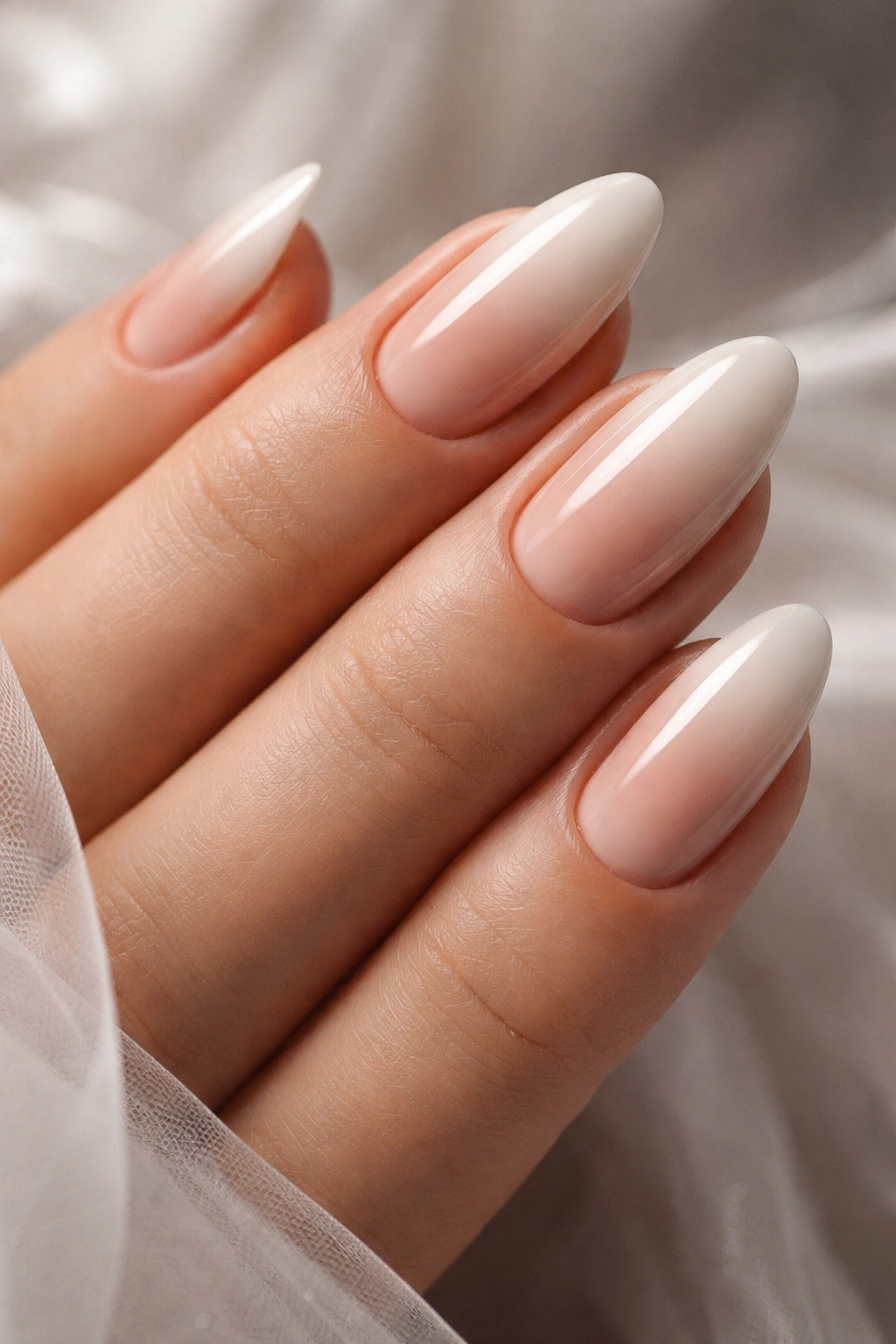 Ombré nails with nude-to-ivory gradient for formal wear