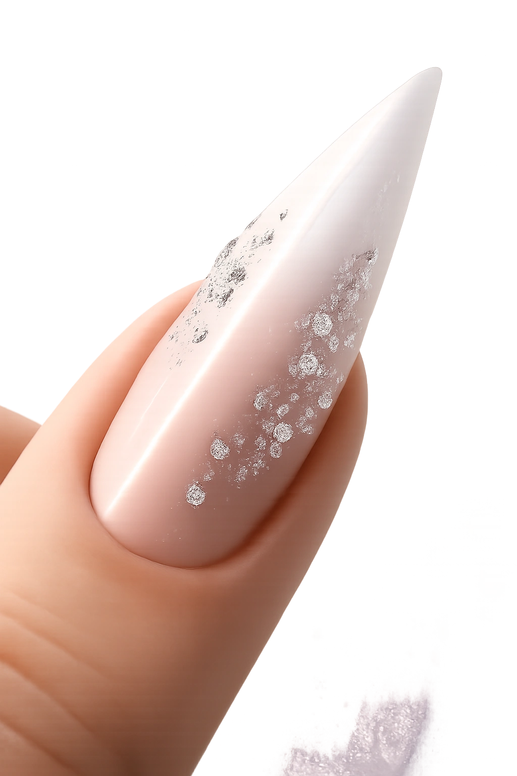 Close-up of a stiletto nail with white-to-clear gradient and scattered rhinestones