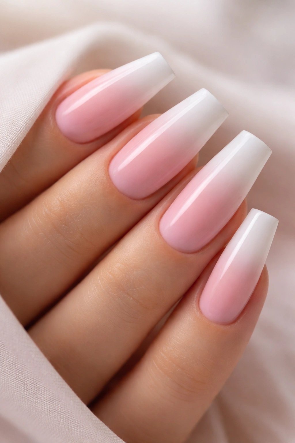 Coffin nails with pink-to-white ombre gradient