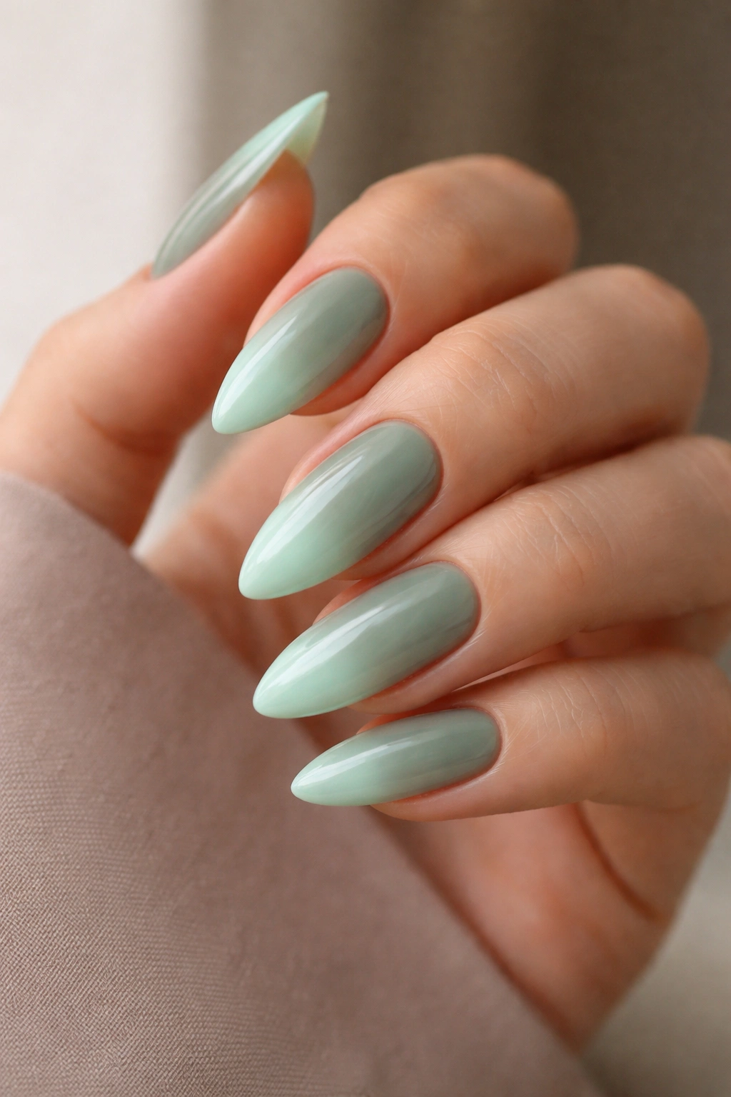 Almond nails sage green to mint ombre.