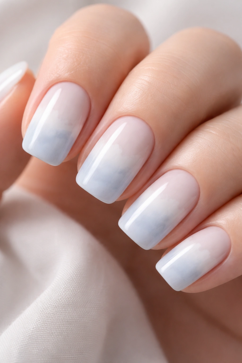 Cloud-like ombre nails in white grey blue