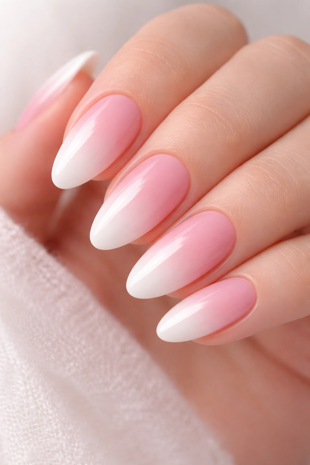 Ombre pink to white nails with smooth gradient