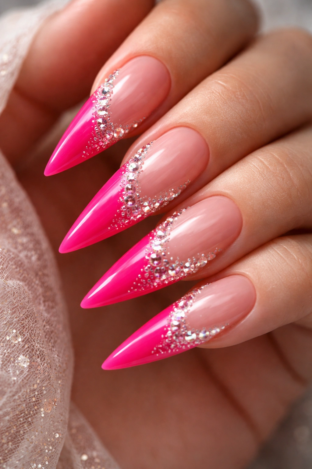 Ombre hot pink to nude nails with rhinestone accent