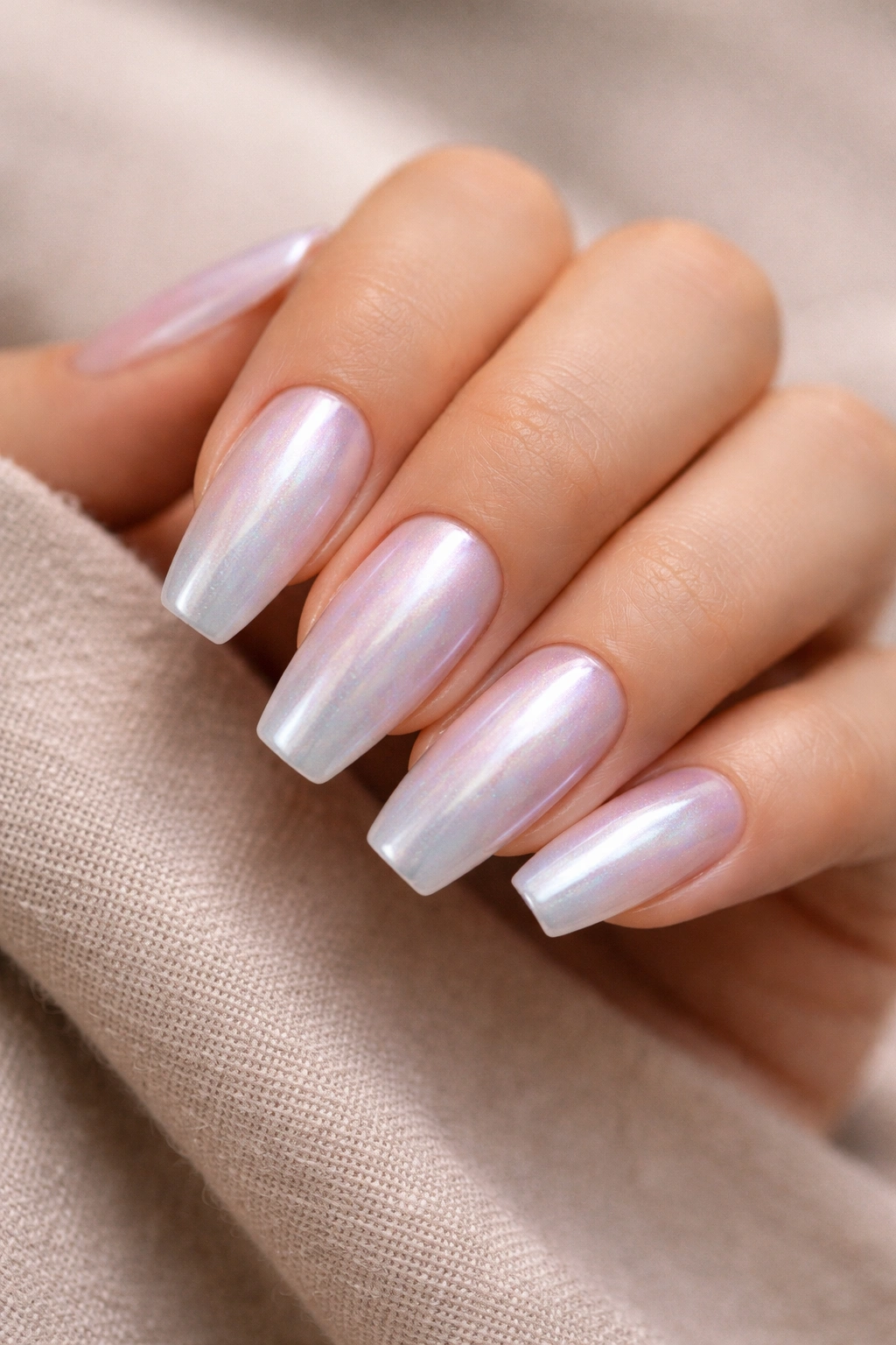 Opal pearl ballerina nails with cloudy sheer base showing soft color shifts