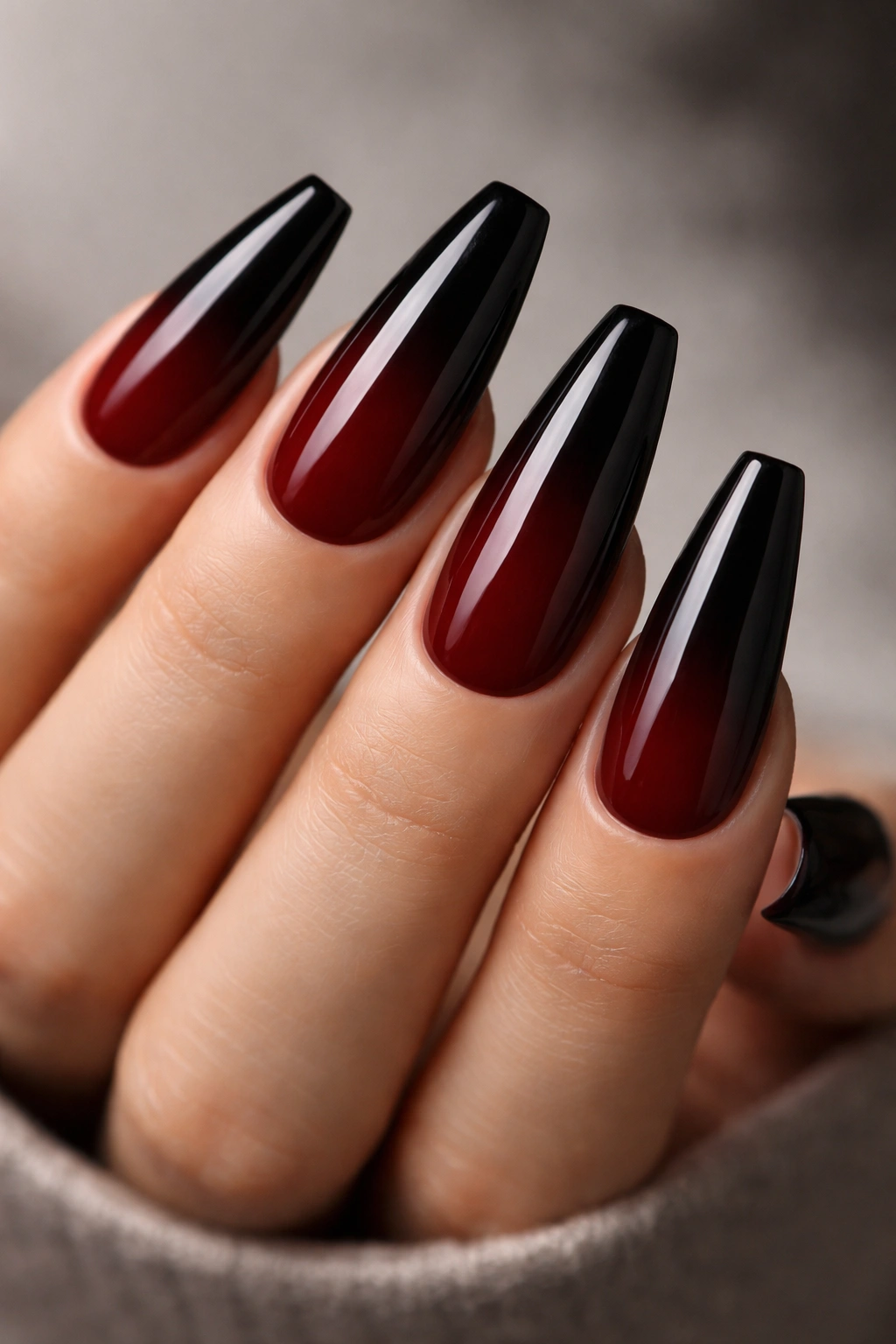 Oxblood to black ombre on ballerina nails with glossy finish