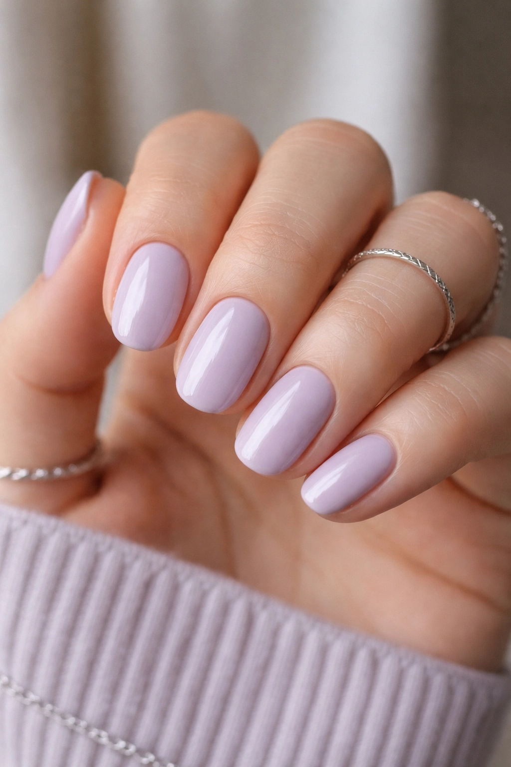 Close-up of pale lavender nails on short ovals