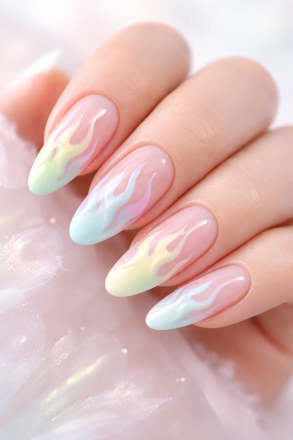 Pastel flame nail art on a clear or nude base