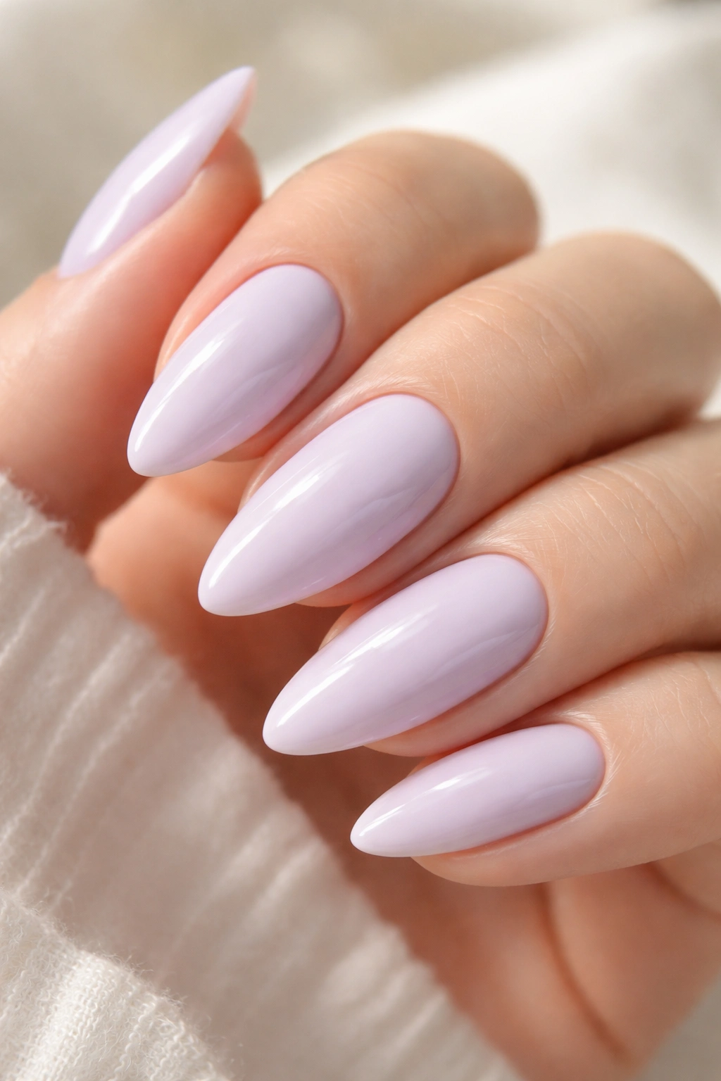 Almond nails with soft lavender pastel manicure