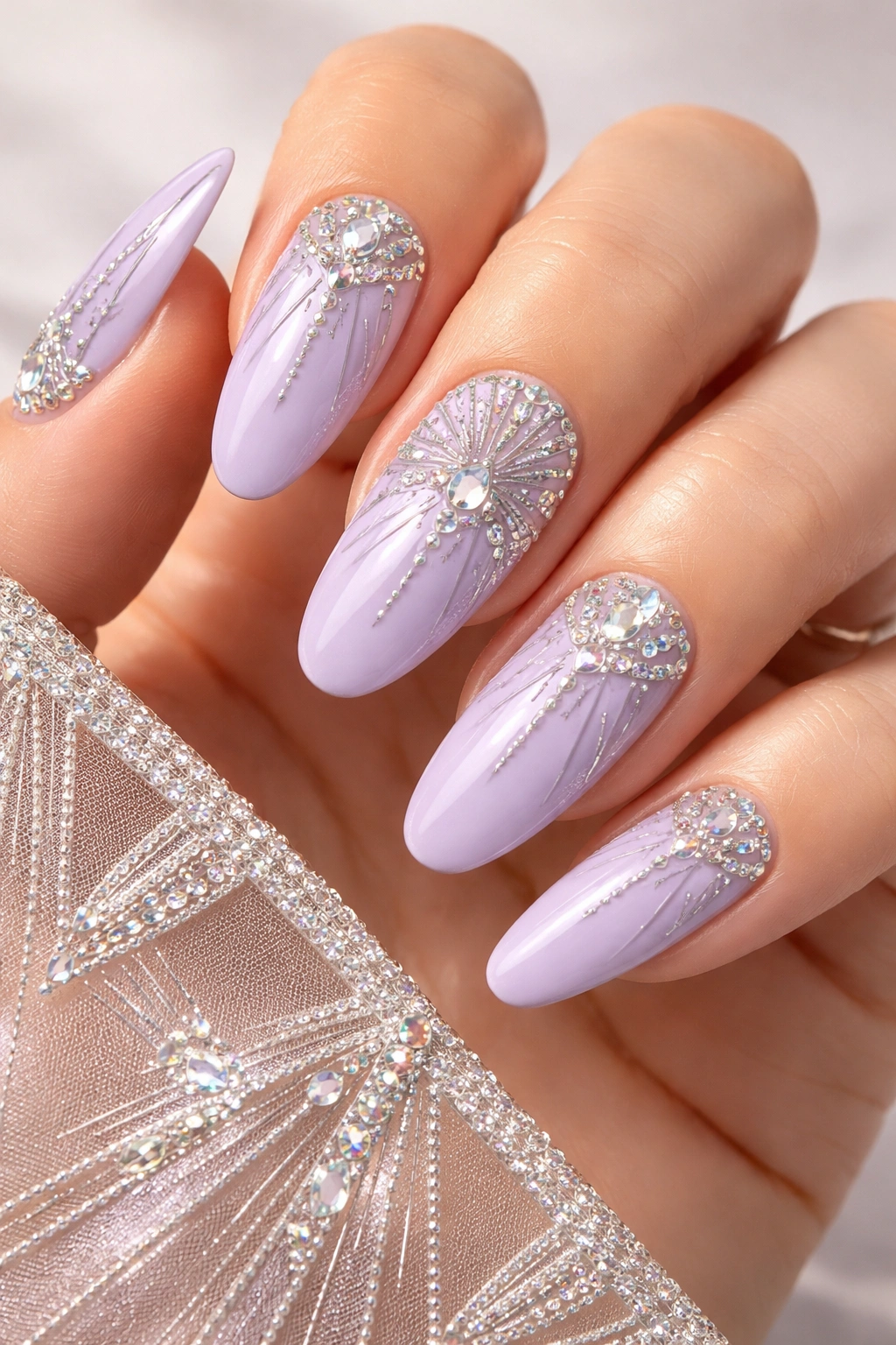 Pastel purple nails with Art Deco rhinestone geometric patterns