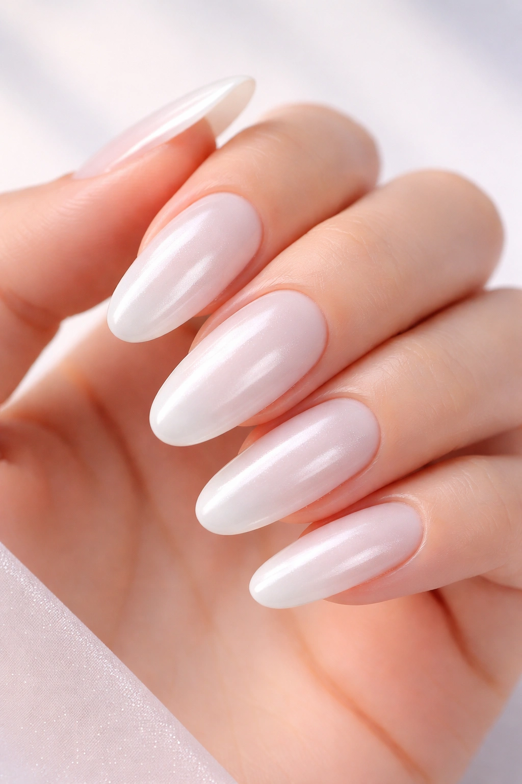 Long oval nails with white-to-pearl subtle ombre