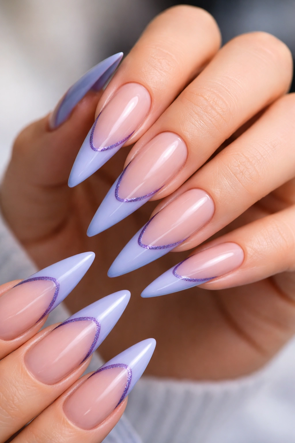 Periwinkle blue nails with purple accent on tips