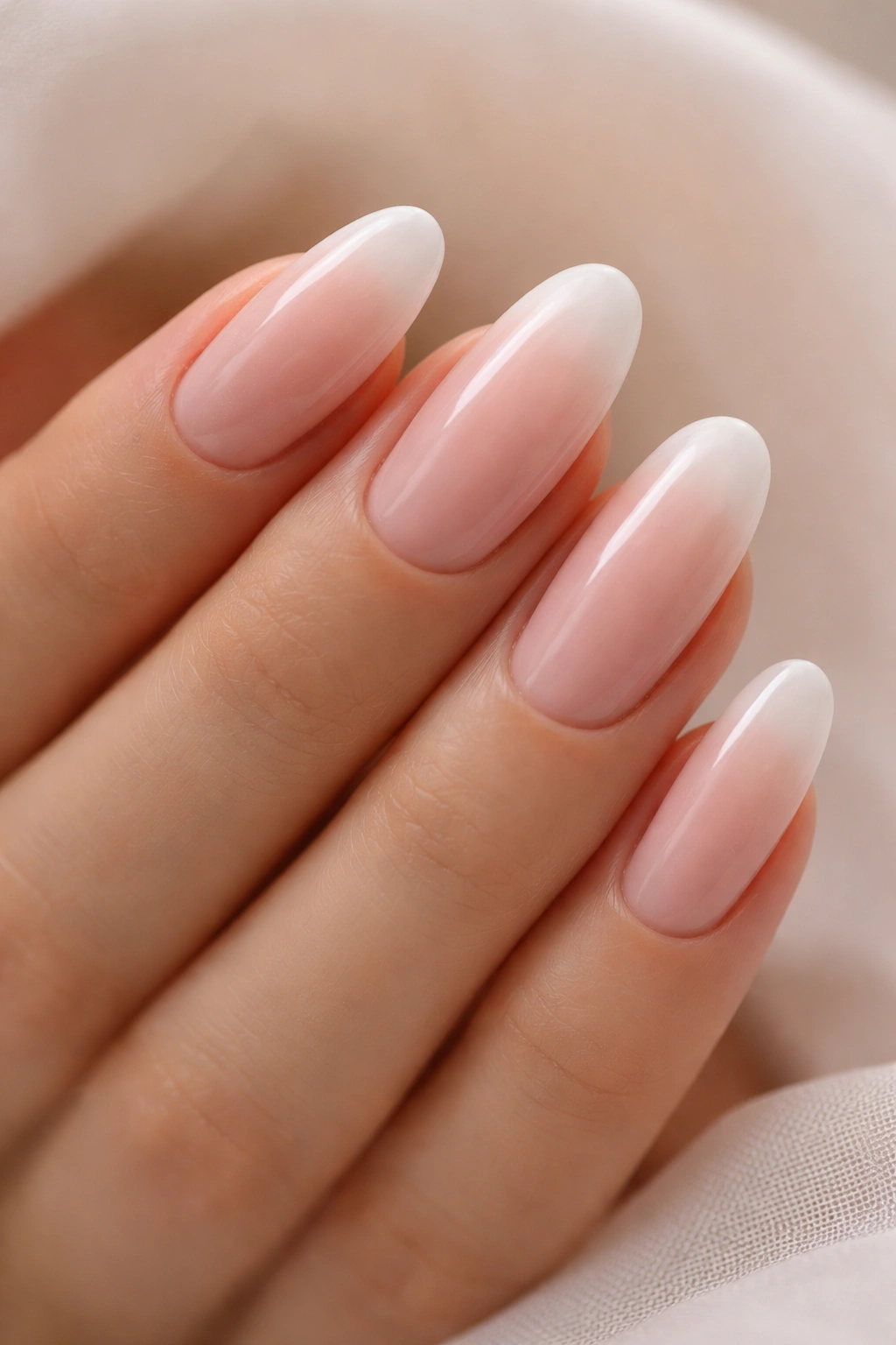 Long oval nails pink champagne gradient with white mist ends
