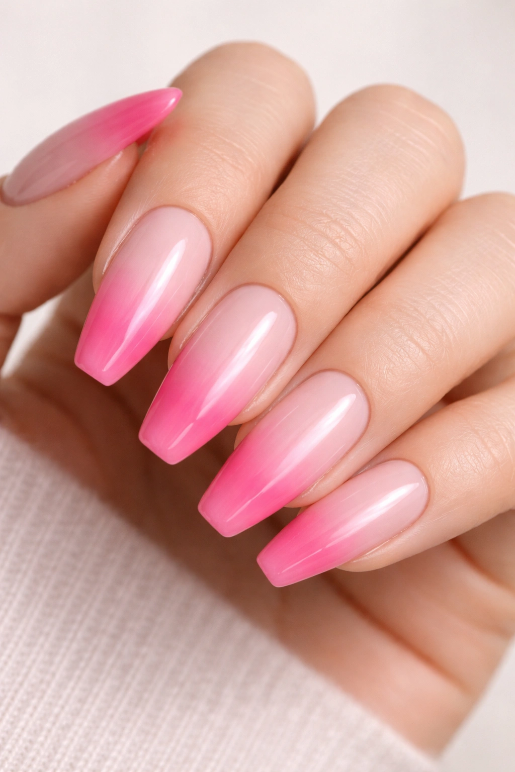 Milky base with diffused pink fade on tips of ballerina nails